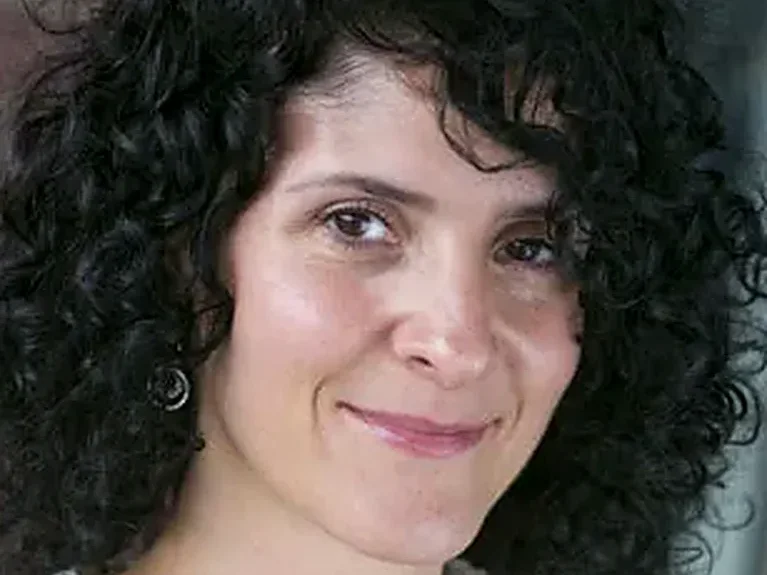 Dr. A. Corinne Xidos, founder of Atlas Chiropractic Health Center